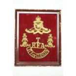 City of Glasgow Royal Artillery collar badges and a shoulder title, together with a Royal