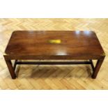 A late 20th Century campaign style brass-mounted mahogany coffee table, 107 cm x 46 cm x 44 cm