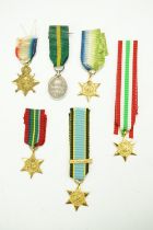 A miniature George V Territorial Force Efficiency medal together with other miniatures