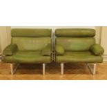 A pair of large aluminium-framed armchairs, circa 1970s, 95 cm wide x 86 cm high