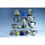 A collection of Torquay and other south coast souvenir ceramics