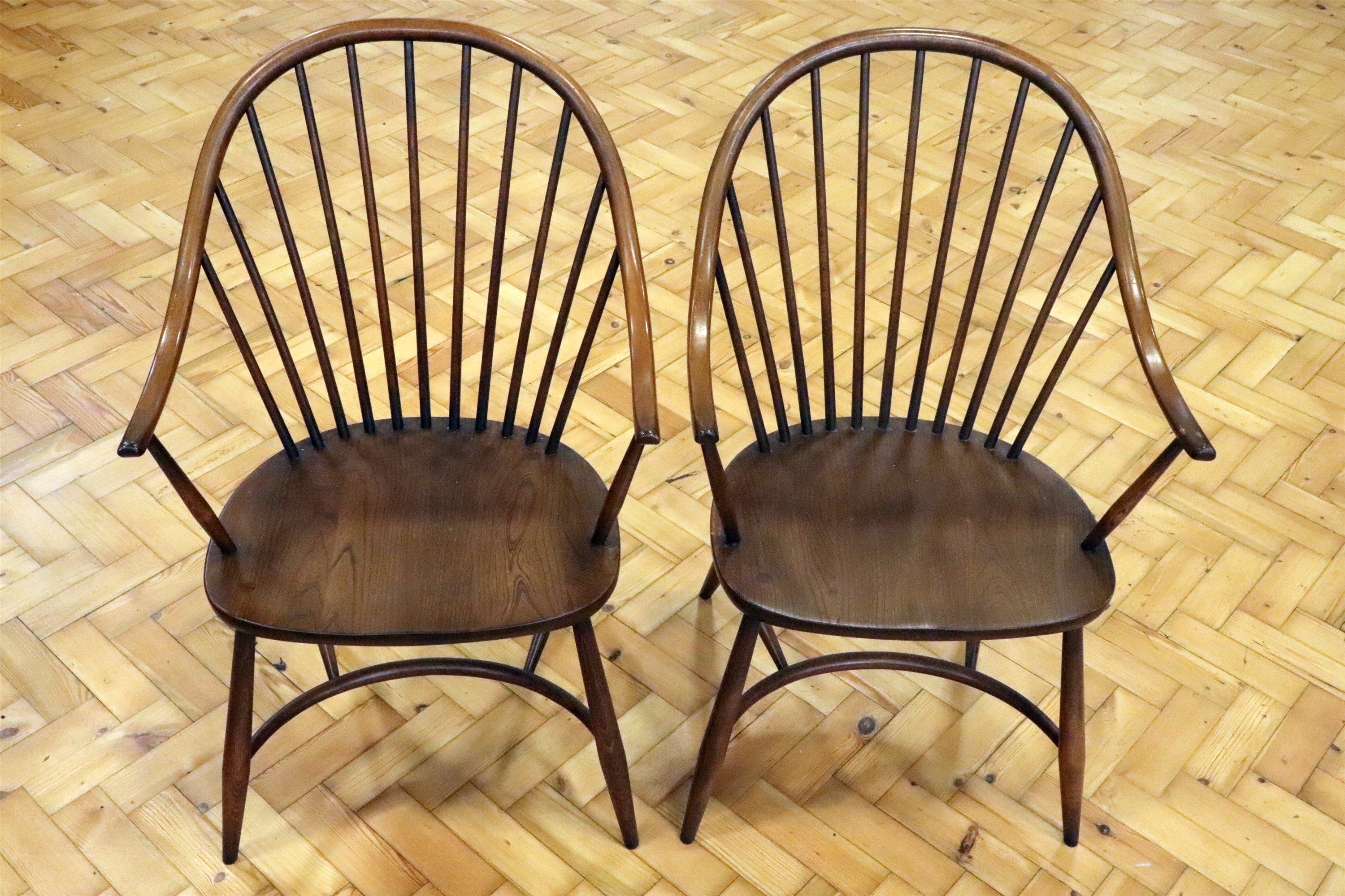 A pair of Ercol armchairs, Latimer or similar pattern with crinoline stretchers