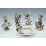 Four Goebel Hummel figurines and an ashtray