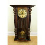 A late 19th / early 20th Century Vienna wall clock, having a two-train movement striking a gong,