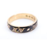 A Victorian 18 ct gold and diamond mourning ring, the band bearing 'In Memory Of' in gold and set
