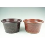 A pair of Errington Reay glazed fireclay planters together with two others garden planters, 31 cm