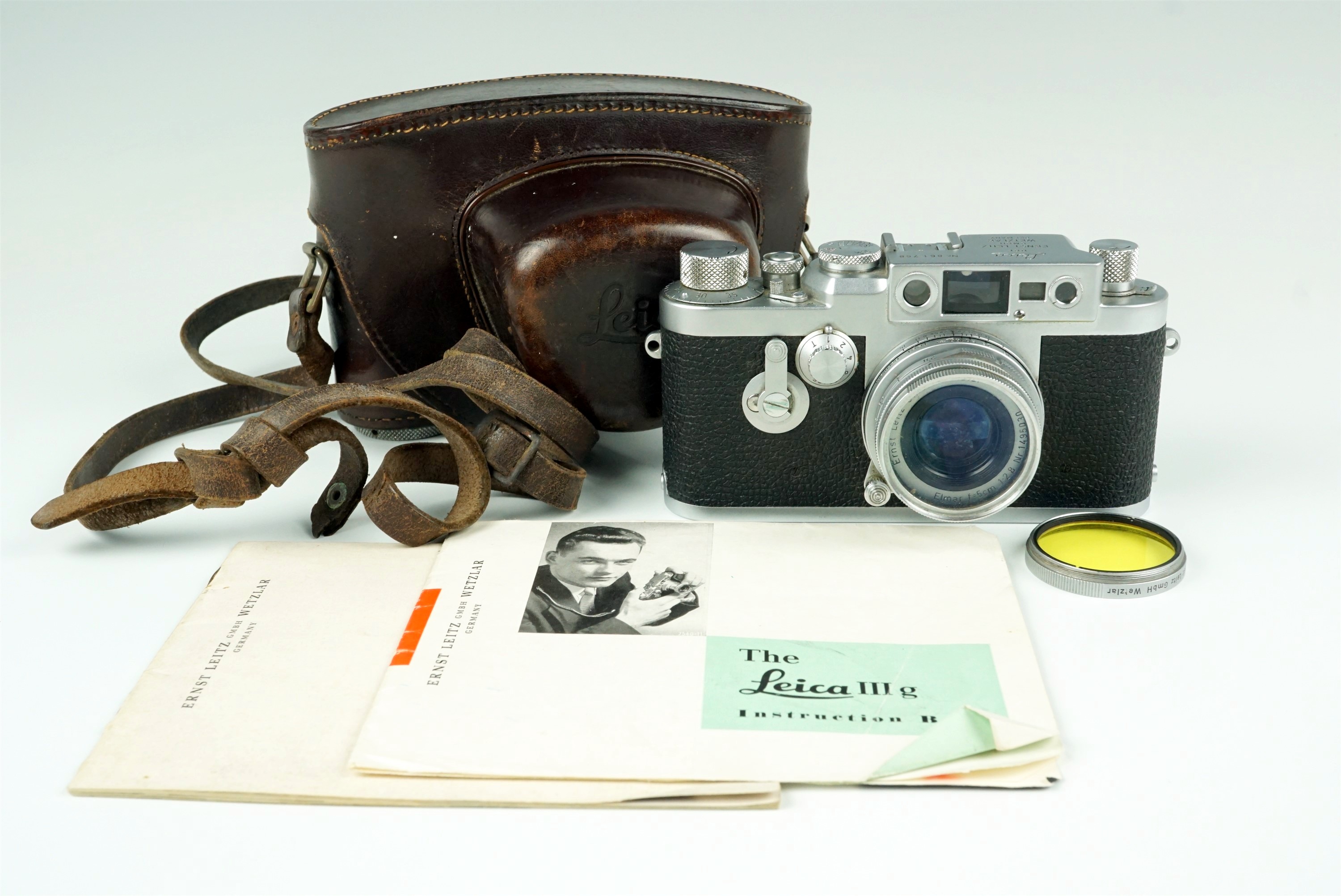 A Leica IIIg Rangefinder 35mm camera, 1957, chrome, with Leitz Elmar f=5cm 1:2.8 50mm lens (serial