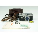 A Leica IIIg Rangefinder 35mm camera, 1957, chrome, with Leitz Elmar f=5cm 1:2.8 50mm lens (serial