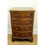 A late 20th Century diminutive reproduction Georgian mahogany serpentine-fronted chest of drawers,