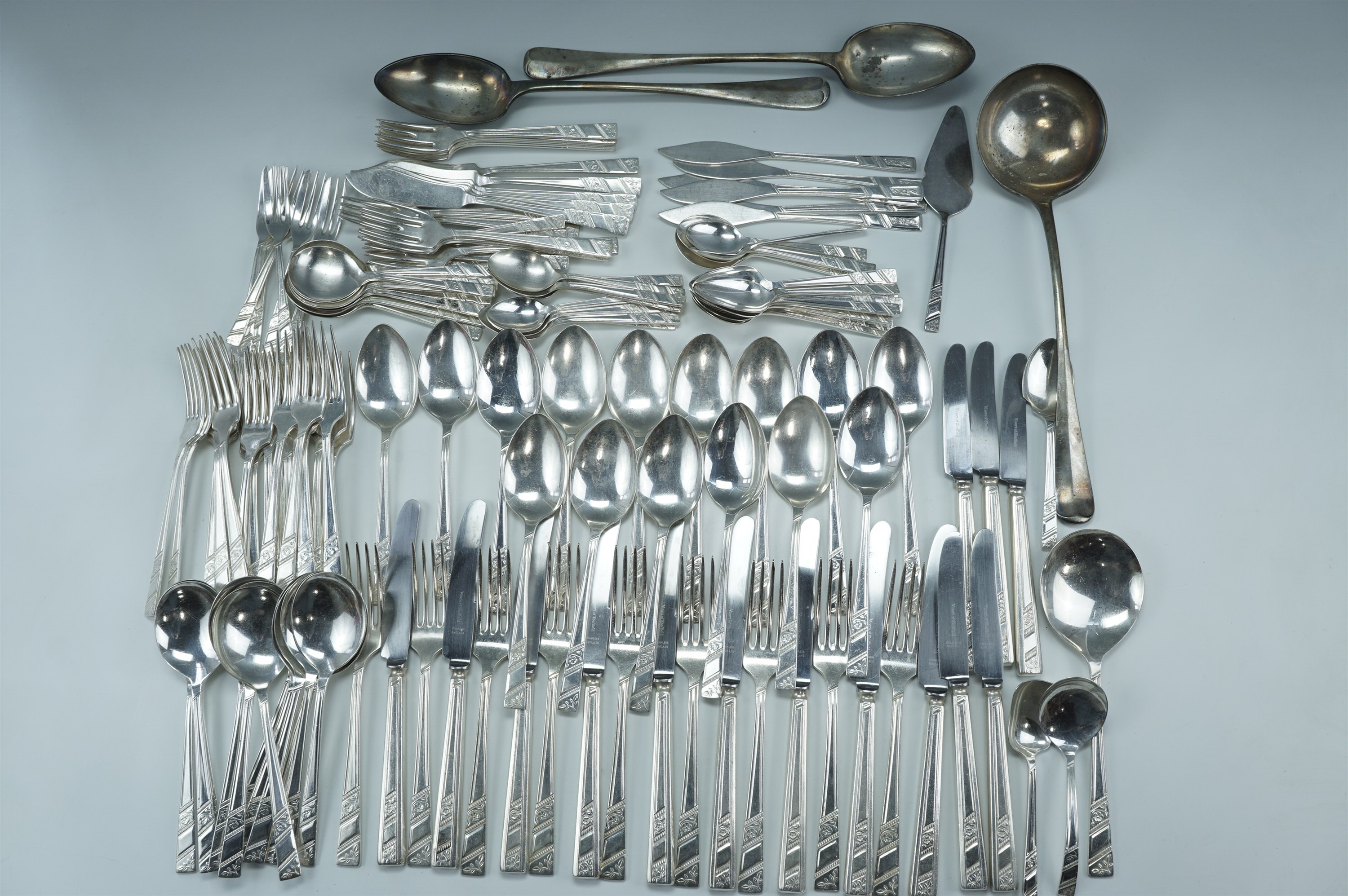 An extensive suite of Viners "Extra A" electroplate cutlery, together with a pair of basting