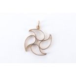 A contemporary 9 ct gold openwork pendant, comprising a blossom-like arrangement of boteh shaped