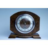 A 1950s walnut mantle clock, face 12 cm