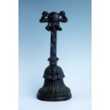 A Victorian cast iron door porter, 30 cm