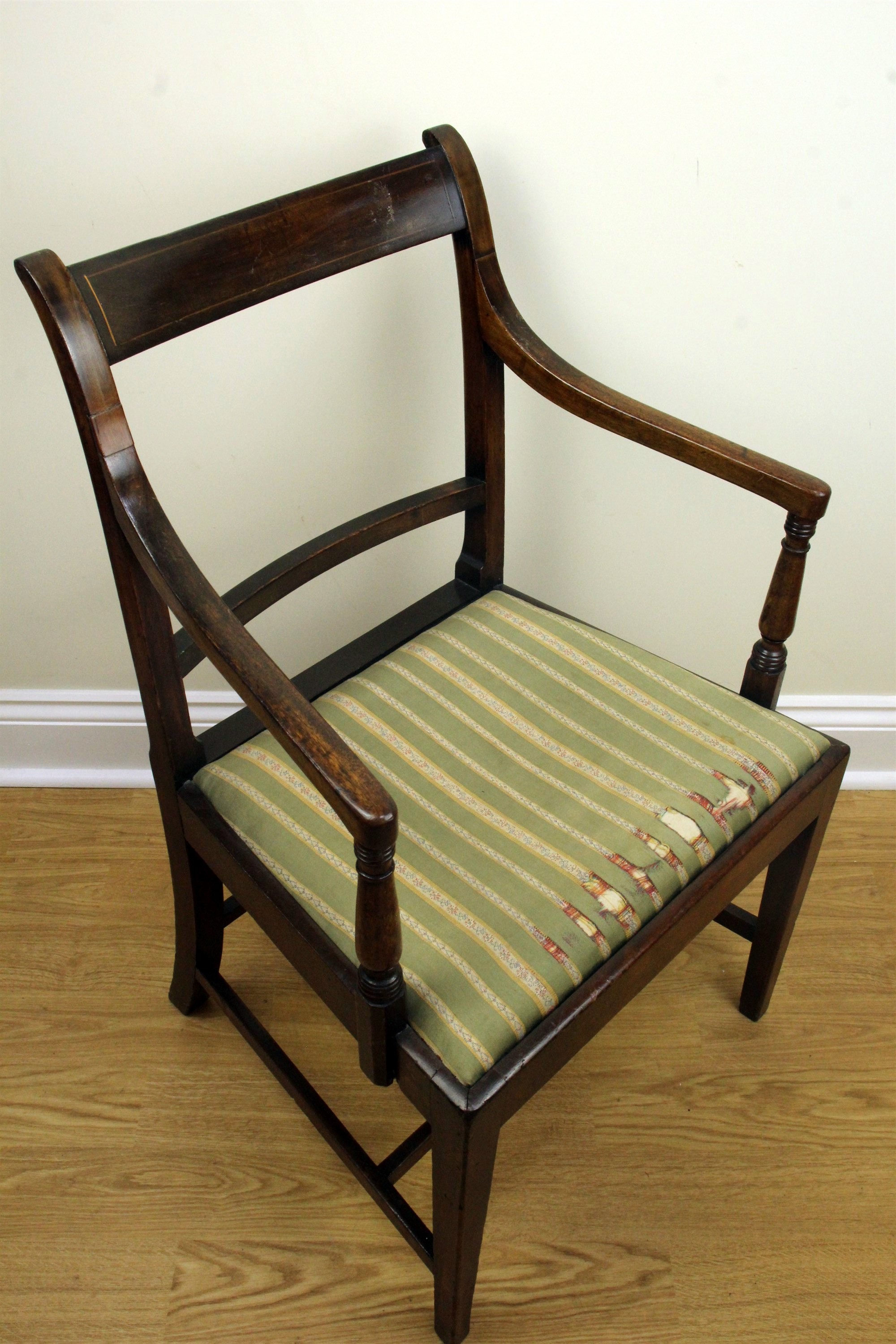 A Regency string-inlaid mahogany armchair