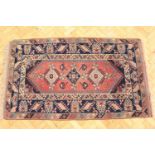 A hand-woven Maslaghan Persian rug, circa 1920s, 200 x 117 cm