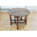 A late 18th / early 19th Century joined oak gate-leg table, 106 cm x 110 cm x 70 cm high