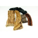 An H Walsh fur coat, together with a stole, another fur coat, a collar and a quantity of fur,
