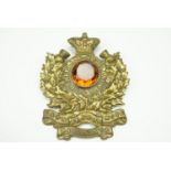 A Victorian Sutherland Highlanders glengarry badge mounted with a citrine coloured stone and