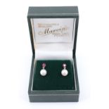 A pair of ruby and pearl ear pendants, the pearls of approx 6 mm, set on 18 ct yellow metal