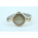 A 1951 lady's 9 ct gold Tudor wristlet watch, having a plated bracelet strap, (running when