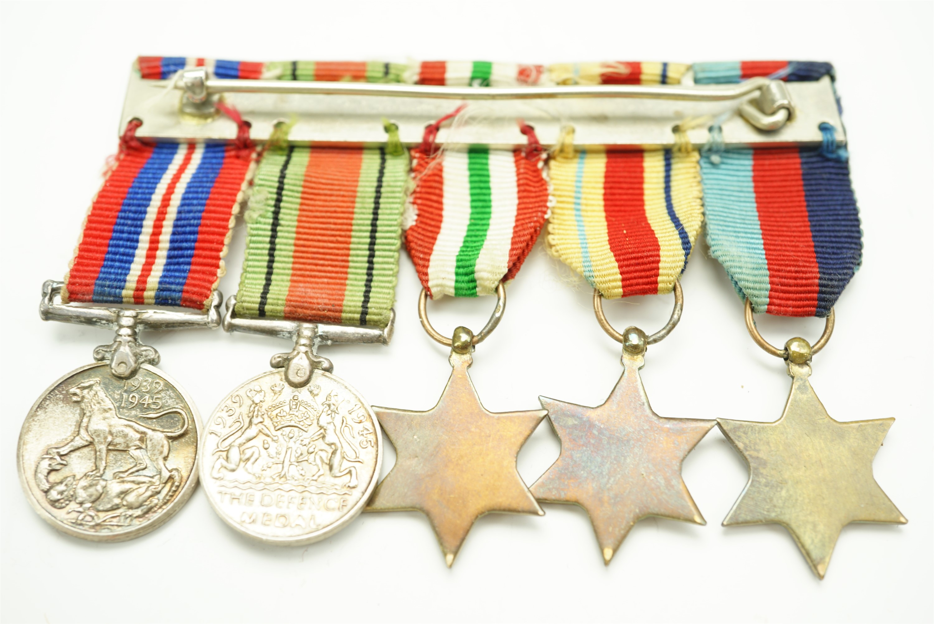 A Second World War miniature campaign medal group together with a quantity of medal ribbon bars etc - Image 3 of 4
