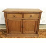 A late 20th Century pine kitchen dresser, 112 cm x 42 cm x 93 cm