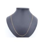 A modern yellow metal matinee necklace, (tests as gold), 3.93 g, 56 cm