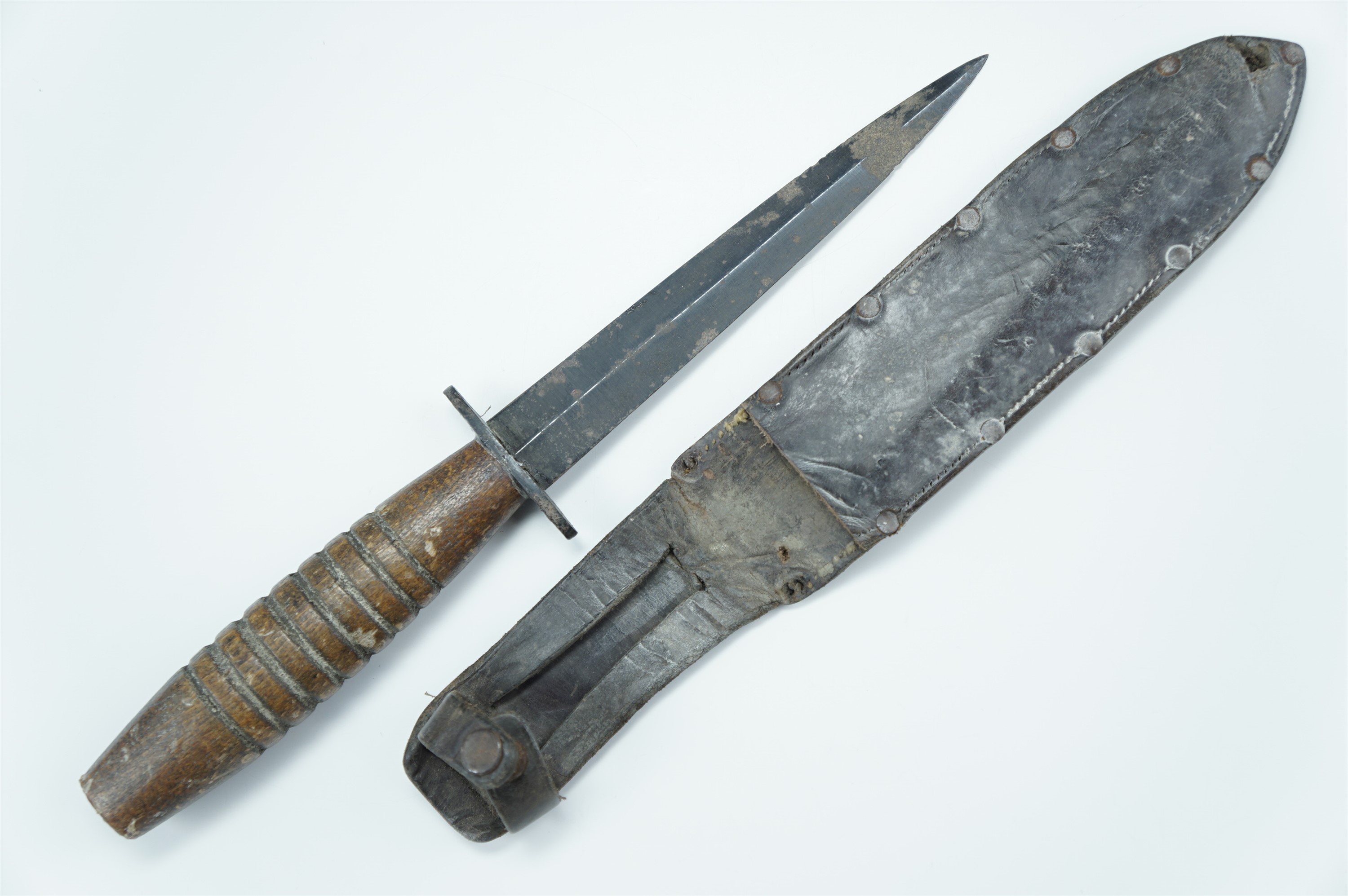 A Second World War wooden-gripped Fairbairn Sykes / FS fighting knife