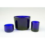 Three cobalt blue glass condiment pot liners, largest 7 x 5.5 x 5.5 cm