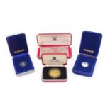 Three cased Pobjoy Mint Isle of Man proof coins together with a Royal Mint 1966 Jersey crown cased