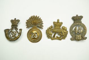 Four Victorian glengarry badges
