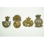 Four Victorian glengarry badges