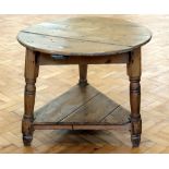 A late 19th / early 20th Century pine cricket table, 82 cm x 68 cm high