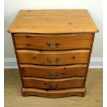 A late 20th Century pine serpentine fronted chest of drawers, 65 cm x 45 cm x 77 cm high