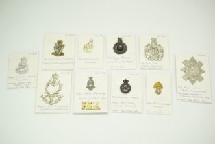 A group of post 1952 cap and other badges
