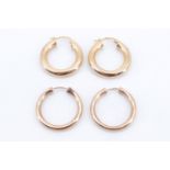 A pair of 9 ct gold hoop earrings 4 x 23 mm, and a pair of yellow metal hoop earrings (test as