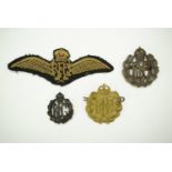 A Royal Flying Corps officer's Service Dress cap badges, a collar badge (brooched and a/f), pilot'