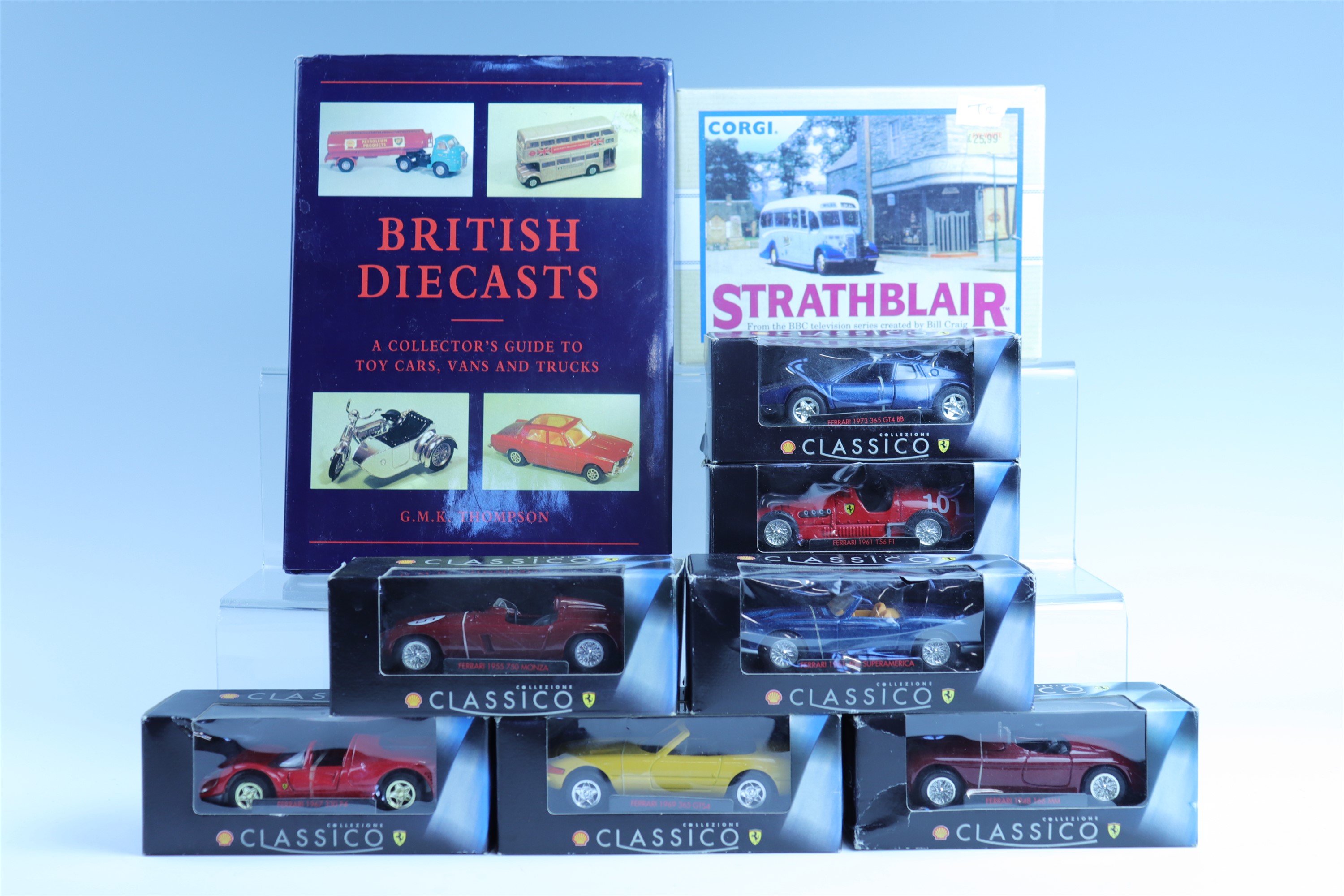 A boxed Corgi Commercials die-cast Strathblair bus, and seven boxed 'Shell' die-cast vehicles,
