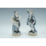 A pair of Meissen figurines of flower sellers in romanticized 18th Century dress, late 19th /