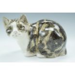 A Winstanley crouching tortoiseshell cat No. 5, signed, 26 cm