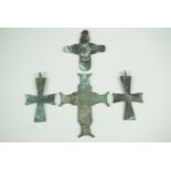 Four Coptic or similar Christian pendant crosses, largest 9.5 cm