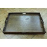 A late 19th / early 20th Century oak tea tray, 47 cm x 69 cm