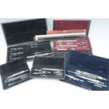 Cased drawing instruments, slide rules etc