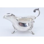 A Georgian shape silver sauce boat, Walker & Hall, Sheffield, 1912, 291 g