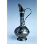 A mid century Norwegian pewter wine ewer by Norge Haandarbeid, designed by Ekensteen Tinn, having an