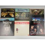 A group of LPs, including Elvis, Eric Clapton, ABBA, Elton John, etc