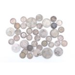 A group of early Victorian and later silver coins, including threepence, two 1921 one florin