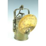 An early to mid 20th Century brass carbide lantern, having an external jet and removable