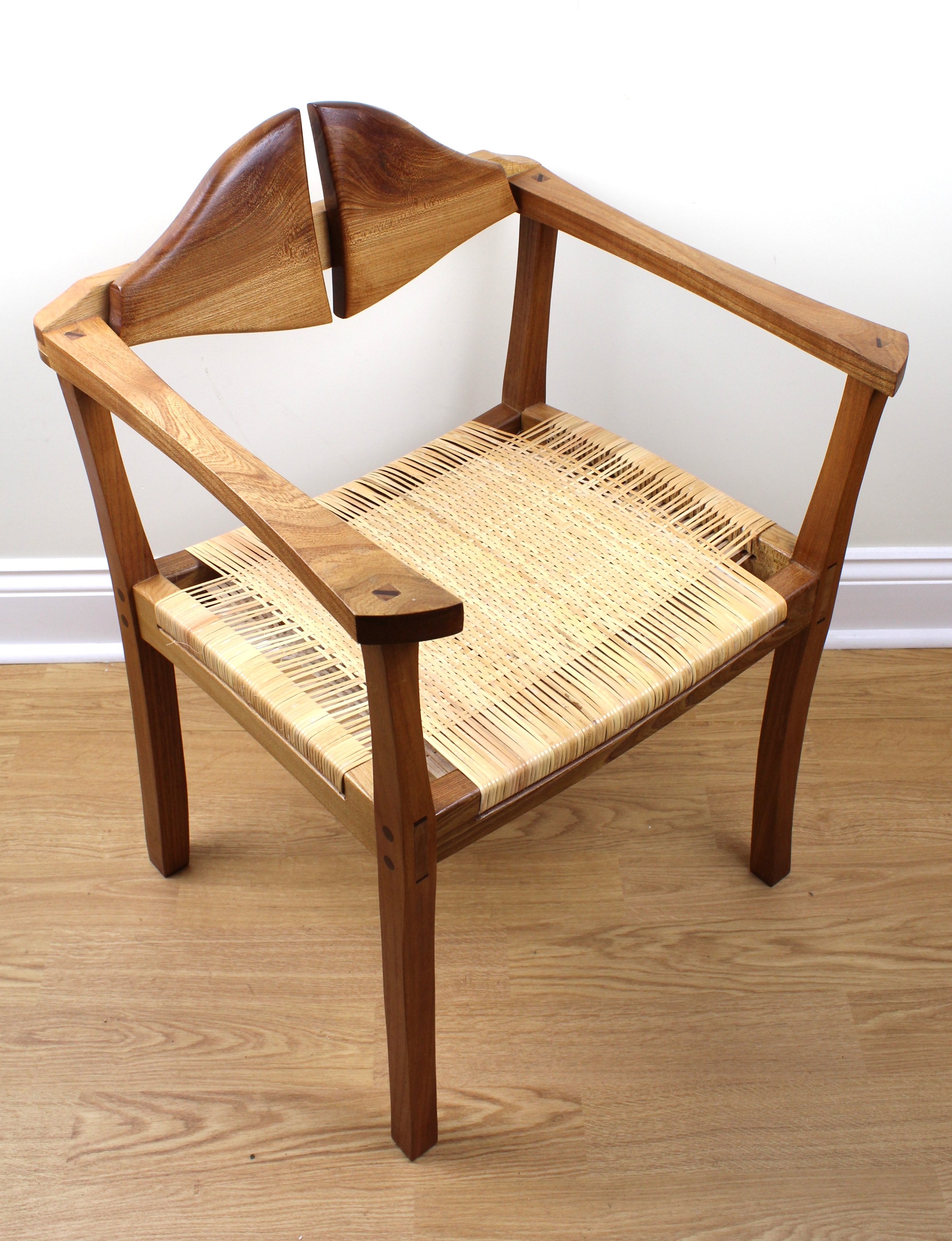 [ California Modern ] A 1970s elm and cane open arm chair by Gene L. Hackleman, employing the