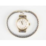 A lady's Longines 9ct gold wristwatch, having a "410" 17 jewel movement, London, 1968, 5.20 g